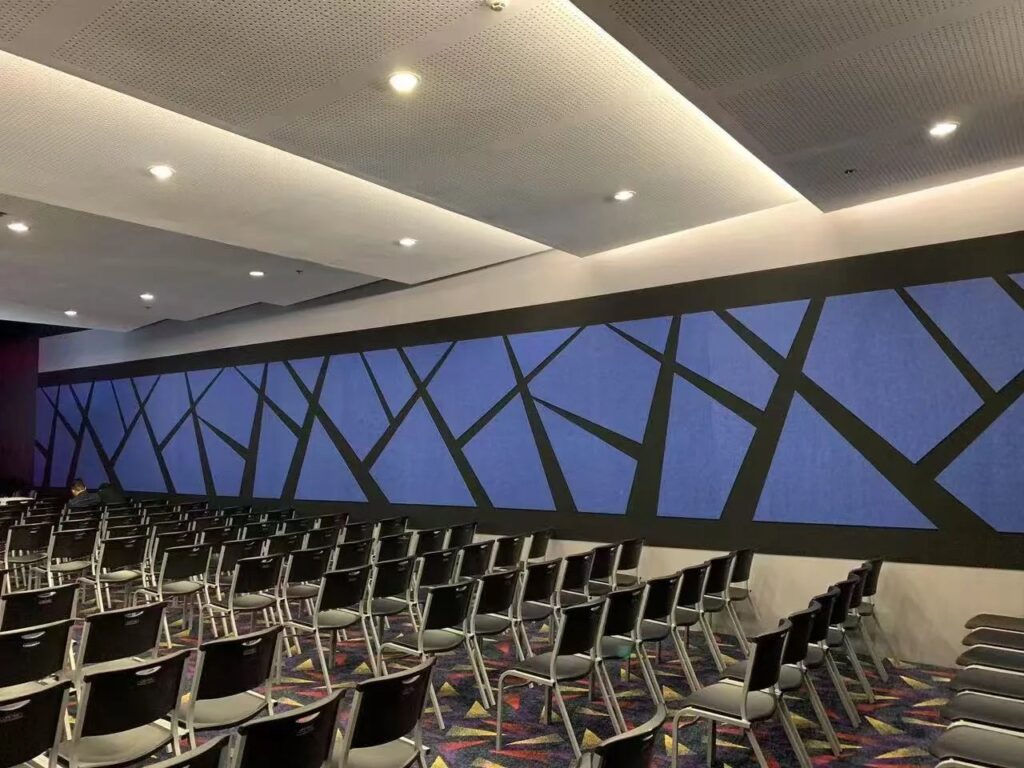 Fabric acoustic panels in auditorium