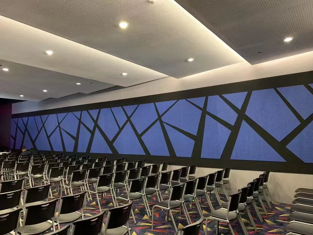 Sound absorption treatment in a school auditorium