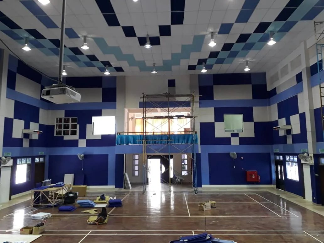 Polyester fiber acoustic panels in a stadium interior